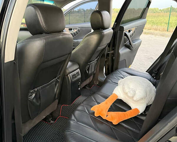 Черный Инфинити FX 35, объемом двигателя 3.5 л и пробегом 196 тыс. км за 13500 $, фото 18 на Automoto.ua