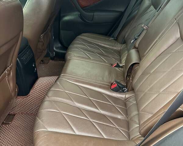 Черный Инфинити FX 35, объемом двигателя 3.5 л и пробегом 145 тыс. км за 13100 $, фото 14 на Automoto.ua