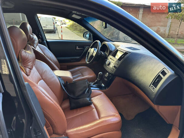 Черный Инфинити FX 35, объемом двигателя 3.5 л и пробегом 253 тыс. км за 8700 $, фото 24 на Automoto.ua