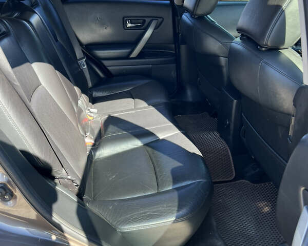 Коричневый Инфинити FX 35, объемом двигателя 3.5 л и пробегом 315 тыс. км за 7500 $, фото 4 на Automoto.ua