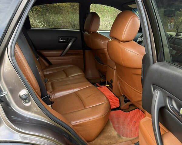 Коричневый Инфинити FX 35, объемом двигателя 3.5 л и пробегом 240 тыс. км за 9500 $, фото 8 на Automoto.ua