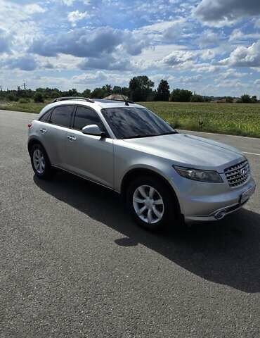 Серый Инфинити FX 35, объемом двигателя 3.5 л и пробегом 328 тыс. км за 8000 $, фото 2 на Automoto.ua