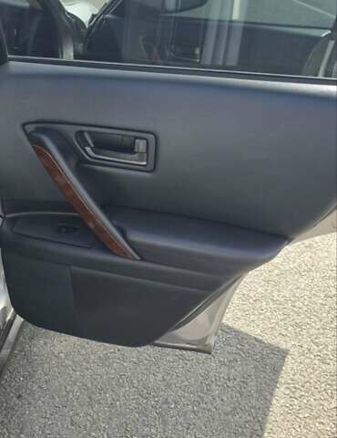 Серый Инфинити FX 35, объемом двигателя 3.5 л и пробегом 328 тыс. км за 8000 $, фото 10 на Automoto.ua