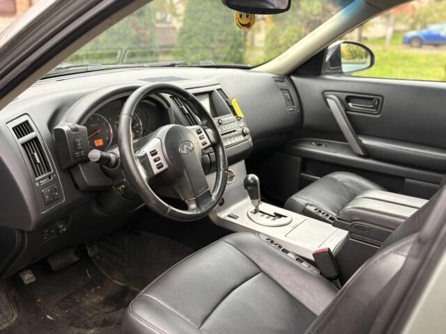 Серый Инфинити FX 35, объемом двигателя 3.5 л и пробегом 287 тыс. км за 7999 $, фото 3 на Automoto.ua