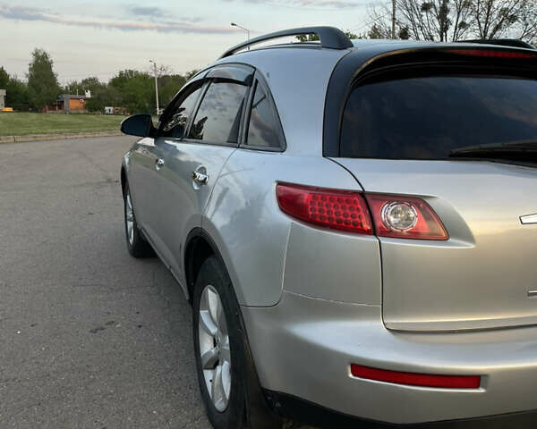 Серый Инфинити FX 35, объемом двигателя 3.5 л и пробегом 177 тыс. км за 7500 $, фото 7 на Automoto.ua