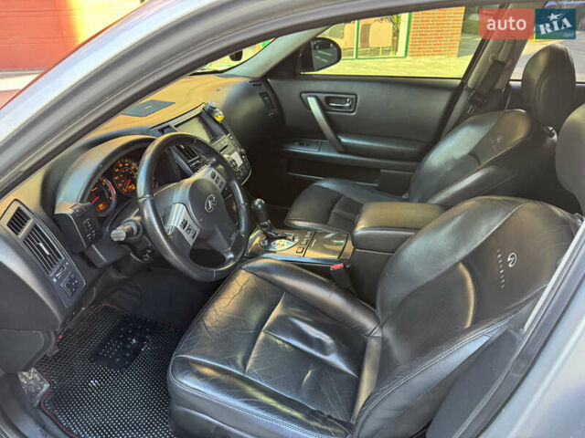 Серый Инфинити FX 35, объемом двигателя 3.5 л и пробегом 280 тыс. км за 7700 $, фото 4 на Automoto.ua