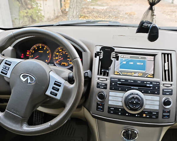 Синий Инфинити FX 35, объемом двигателя 3.5 л и пробегом 230 тыс. км за 8200 $, фото 11 на Automoto.ua