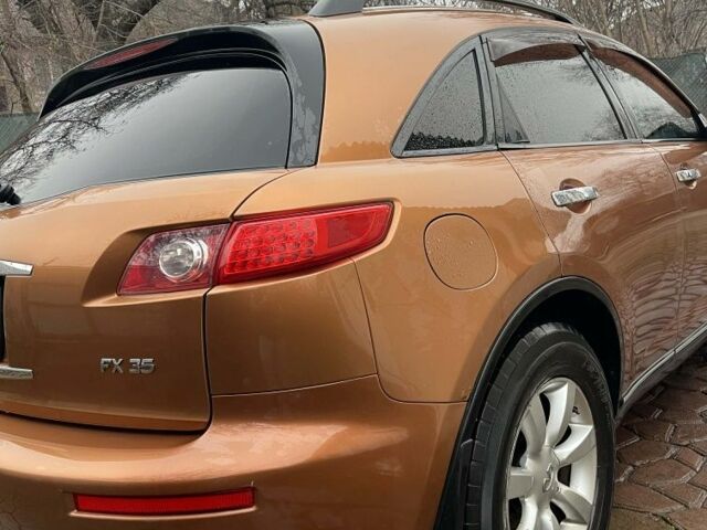 Помаранчевий Інфініті FX 35, об'ємом двигуна 0 л та пробігом 367 тис. км за 8000 $, фото 2 на Automoto.ua