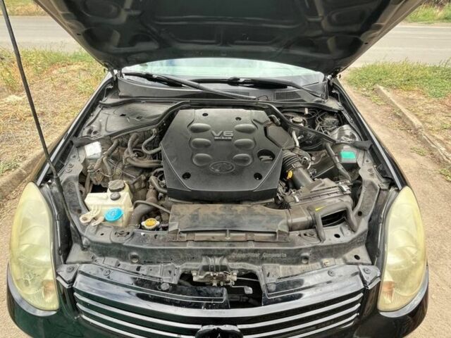 Черный Инфинити G35, объемом двигателя 3.5 л и пробегом 270 тыс. км за 2700 $, фото 1 на Automoto.ua