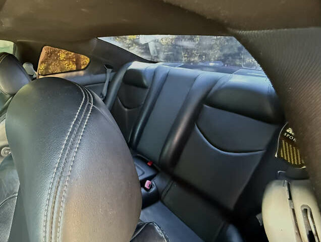 Красный Инфинити G37, объемом двигателя 3.7 л и пробегом 210 тыс. км за 10000 $, фото 8 на Automoto.ua