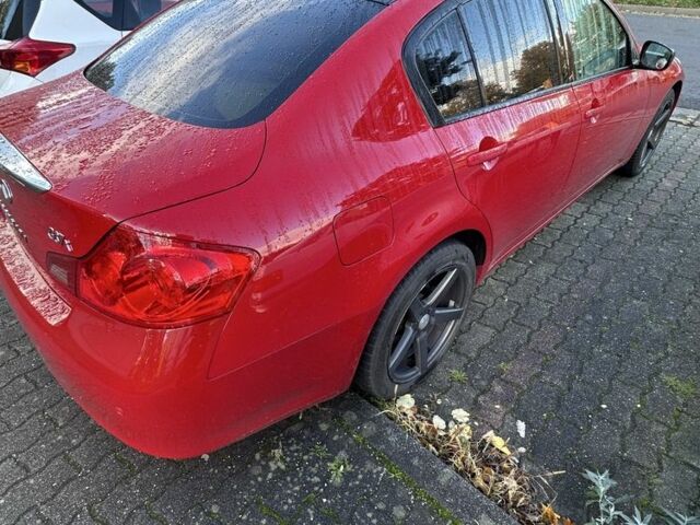 Красный Инфинити G37, объемом двигателя 3.7 л и пробегом 135 тыс. км за 11671 $, фото 2 на Automoto.ua