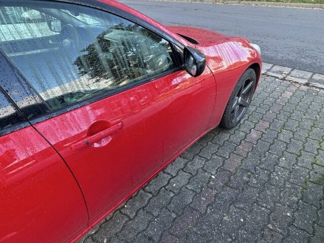 Красный Инфинити G37, объемом двигателя 3.7 л и пробегом 135 тыс. км за 11671 $, фото 6 на Automoto.ua