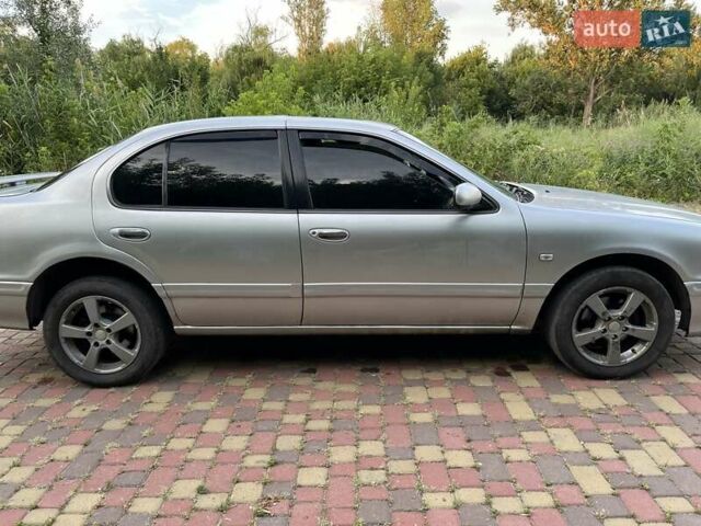 Сірий Інфініті I30, об'ємом двигуна 3 л та пробігом 298 тис. км за 3000 $, фото 4 на Automoto.ua