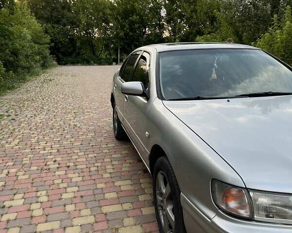 Сірий Інфініті I30, об'ємом двигуна 3 л та пробігом 298 тис. км за 3000 $, фото 6 на Automoto.ua