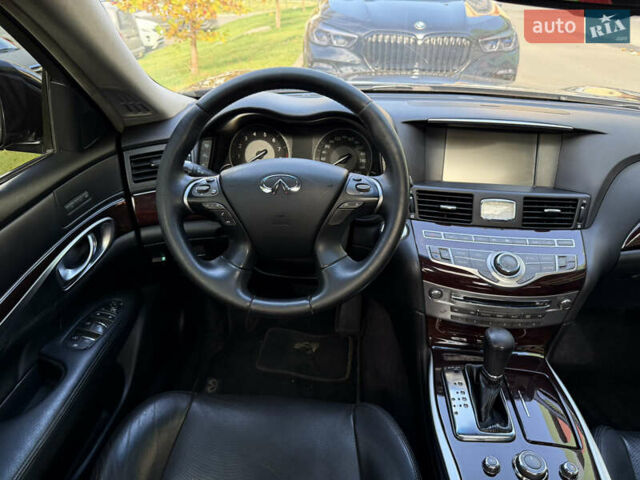 Черный Инфинити M25, объемом двигателя 2.5 л и пробегом 250 тыс. км за 9500 $, фото 6 на Automoto.ua