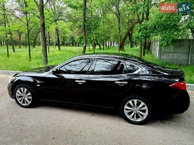 Черный Инфинити M25, объемом двигателя 2.5 л и пробегом 250 тыс. км за 9300 $, фото 1 на Automoto.ua