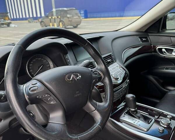 Чорний Інфініті M25, об'ємом двигуна 2.5 л та пробігом 140 тис. км за 14500 $, фото 1 на Automoto.ua