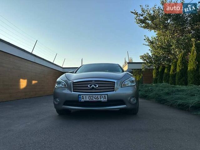 Серый Инфинити M37, объемом двигателя 3.7 л и пробегом 166 тыс. км за 12500 $, фото 1 на Automoto.ua