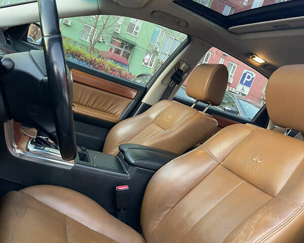 Чорний Інфініті M45, об'ємом двигуна 4.49 л та пробігом 129 тис. км за 5500 $, фото 14 на Automoto.ua