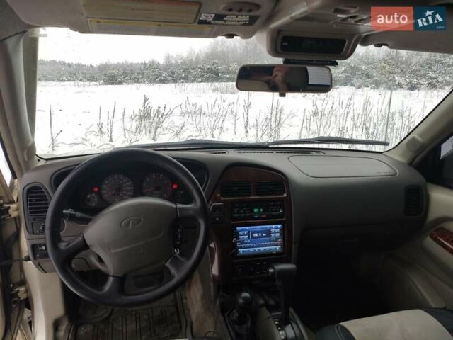 Бежевый Инфинити QX4, объемом двигателя 3.3 л и пробегом 350 тыс. км за 5500 $, фото 14 на Automoto.ua