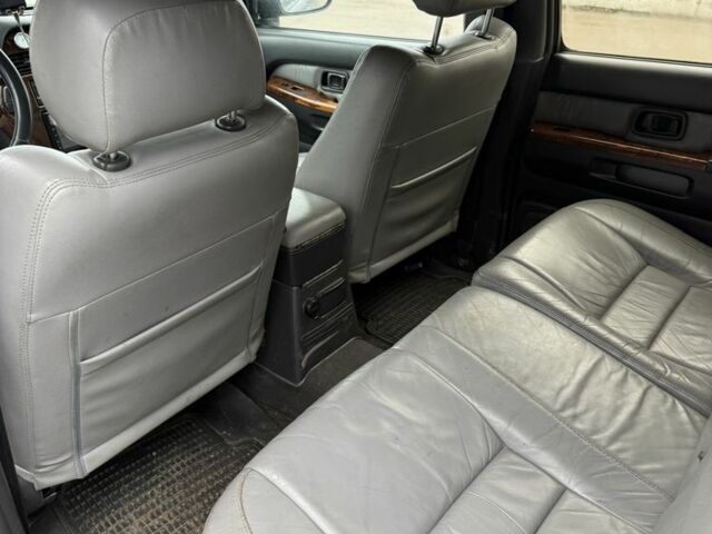 Чорний Інфініті QX4, об'ємом двигуна 3.3 л та пробігом 250 тис. км за 5600 $, фото 6 на Automoto.ua