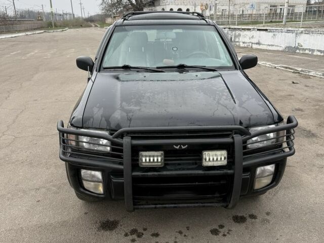 Чорний Інфініті QX4, об'ємом двигуна 3.3 л та пробігом 250 тис. км за 5600 $, фото 1 на Automoto.ua