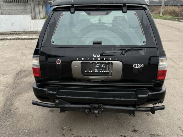 Чорний Інфініті QX4, об'ємом двигуна 3.3 л та пробігом 250 тис. км за 5600 $, фото 4 на Automoto.ua
