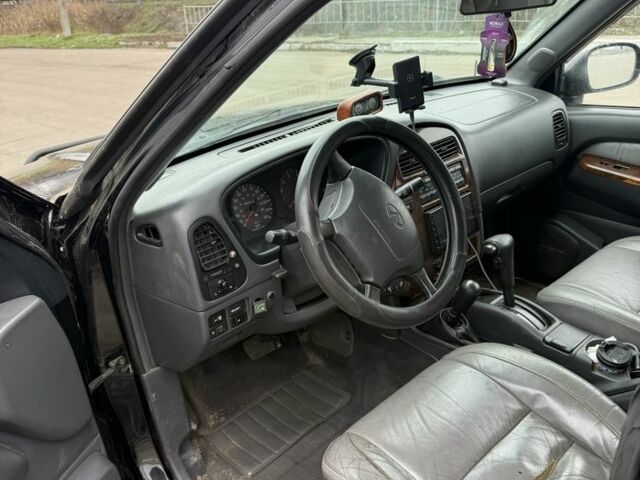 Чорний Інфініті QX4, об'ємом двигуна 3.3 л та пробігом 250 тис. км за 5600 $, фото 7 на Automoto.ua