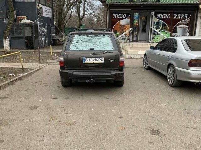 Зелений Інфініті QX4, об'ємом двигуна 3.3 л та пробігом 300 тис. км за 4000 $, фото 4 на Automoto.ua