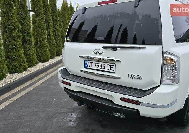 Белый Инфинити QX56, объемом двигателя 5.6 л и пробегом 232 тыс. км за 14000 $, фото 2 на Automoto.ua