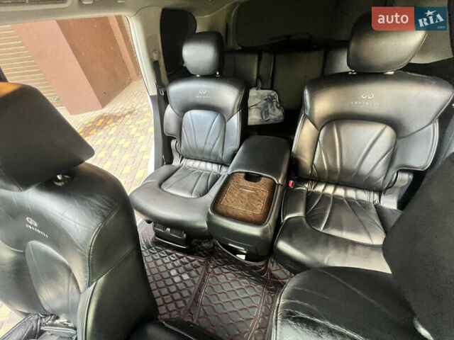 Белый Инфинити QX56, объемом двигателя 5.55 л и пробегом 220 тыс. км за 17350 $, фото 3 на Automoto.ua