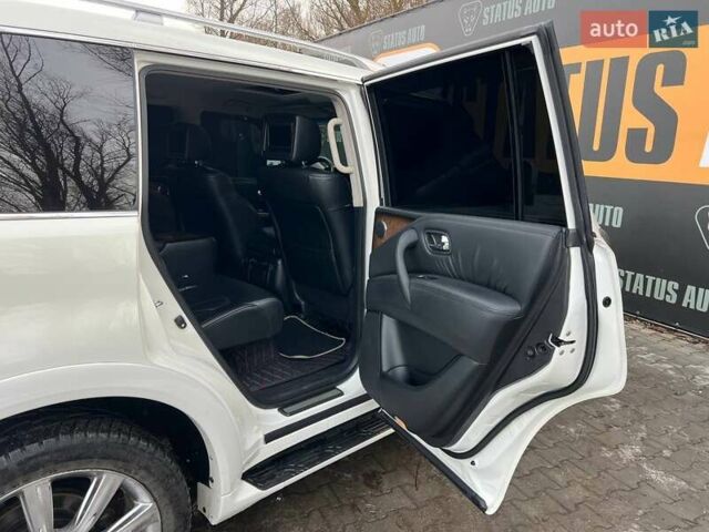 Белый Инфинити QX56, объемом двигателя 5.55 л и пробегом 215 тыс. км за 18700 $, фото 32 на Automoto.ua