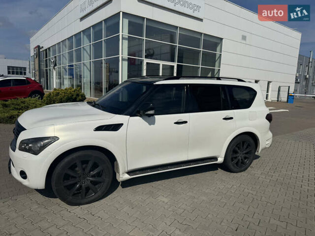 Белый Инфинити QX56, объемом двигателя 5.55 л и пробегом 264 тыс. км за 13200 $, фото 2 на Automoto.ua