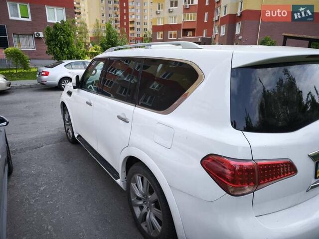 Белый Инфинити QX56, объемом двигателя 5.55 л и пробегом 258 тыс. км за 23000 $, фото 2 на Automoto.ua