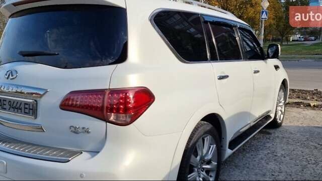 Белый Инфинити QX56, объемом двигателя 5.55 л и пробегом 127 тыс. км за 21000 $, фото 3 на Automoto.ua