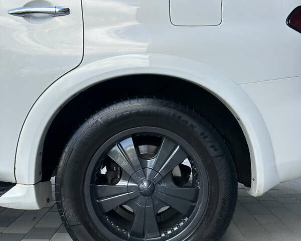 Білий Інфініті QX56, об'ємом двигуна 5.55 л та пробігом 208 тис. км за 23000 $, фото 9 на Automoto.ua