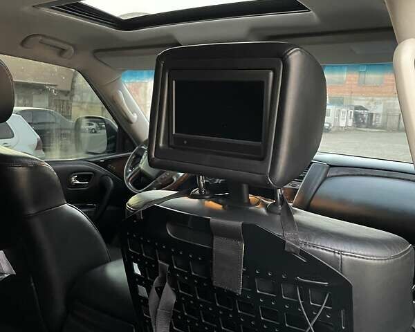 Білий Інфініті QX56, об'ємом двигуна 5.6 л та пробігом 230 тис. км за 27900 $, фото 10 на Automoto.ua
