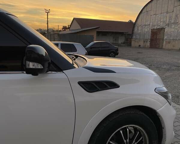 Білий Інфініті QX56, об'ємом двигуна 5.6 л та пробігом 230 тис. км за 27900 $, фото 17 на Automoto.ua