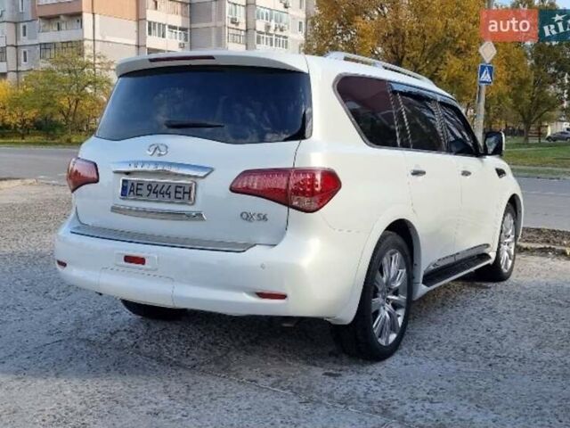 Белый Инфинити QX56, объемом двигателя 5.55 л и пробегом 127 тыс. км за 21000 $, фото 2 на Automoto.ua