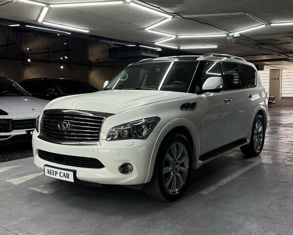 Белый Инфинити QX56, объемом двигателя 5.55 л и пробегом 132 тыс. км за 19000 $, фото 2 на Automoto.ua