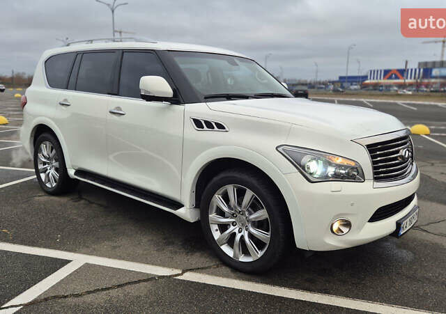 Белый Инфинити QX56, объемом двигателя 5.55 л и пробегом 246 тыс. км за 18300 $, фото 1 на Automoto.ua