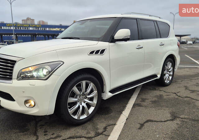 Белый Инфинити QX56, объемом двигателя 5.55 л и пробегом 246 тыс. км за 18300 $, фото 3 на Automoto.ua