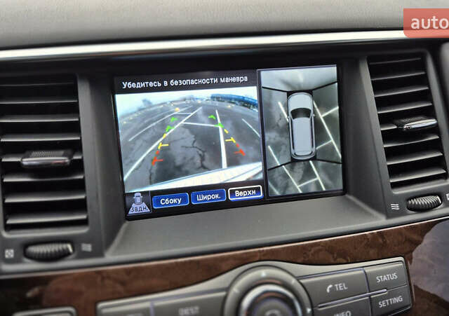 Белый Инфинити QX56, объемом двигателя 5.55 л и пробегом 246 тыс. км за 18300 $, фото 6 на Automoto.ua