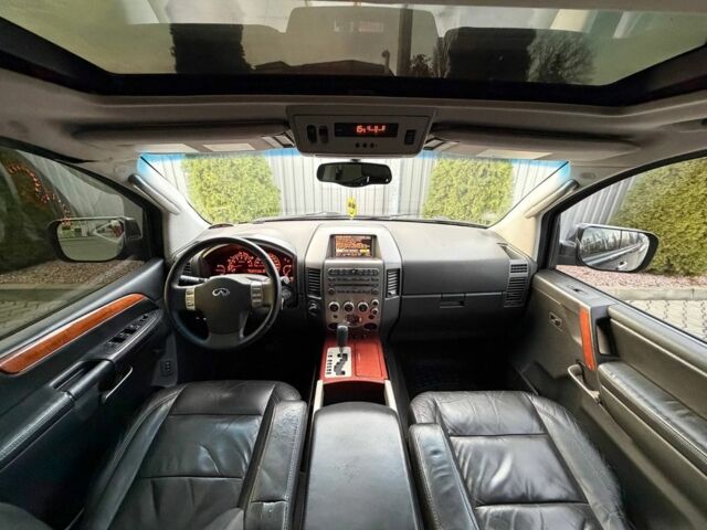 Черный Инфинити QX56, объемом двигателя 5.6 л и пробегом 310 тыс. км за 8100 $, фото 6 на Automoto.ua