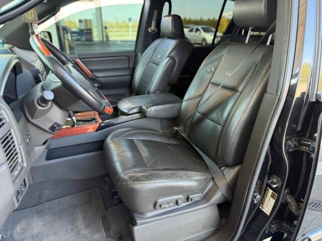 Чорний Інфініті QX56, об'ємом двигуна 0 л та пробігом 170 тис. км за 8700 $, фото 8 на Automoto.ua