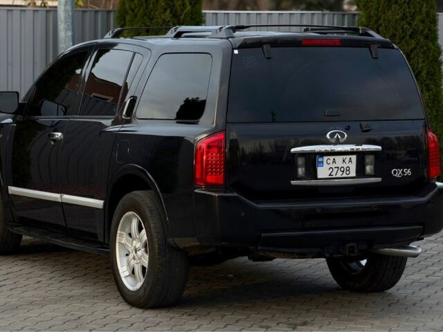 Черный Инфинити QX56, объемом двигателя 5.6 л и пробегом 310 тыс. км за 8100 $, фото 3 на Automoto.ua