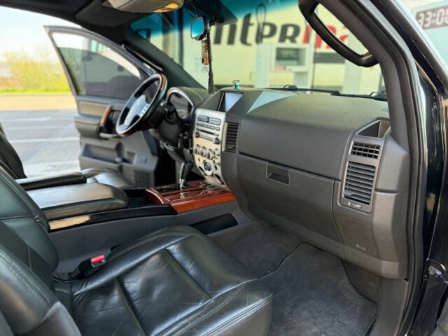 Чорний Інфініті QX56, об'ємом двигуна 0 л та пробігом 170 тис. км за 8700 $, фото 12 на Automoto.ua