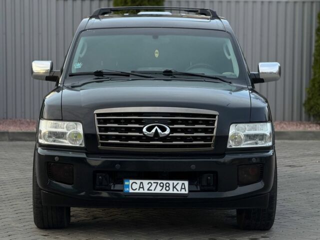 Черный Инфинити QX56, объемом двигателя 5.6 л и пробегом 310 тыс. км за 8100 $, фото 2 на Automoto.ua
