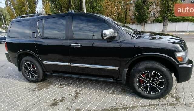 Чорний Інфініті QX56, об'ємом двигуна 5.6 л та пробігом 290 тис. км за 9000 $, фото 1 на Automoto.ua