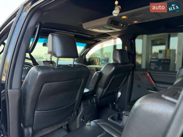 Чорний Інфініті QX56, об'ємом двигуна 5.55 л та пробігом 170 тис. км за 8500 $, фото 11 на Automoto.ua
